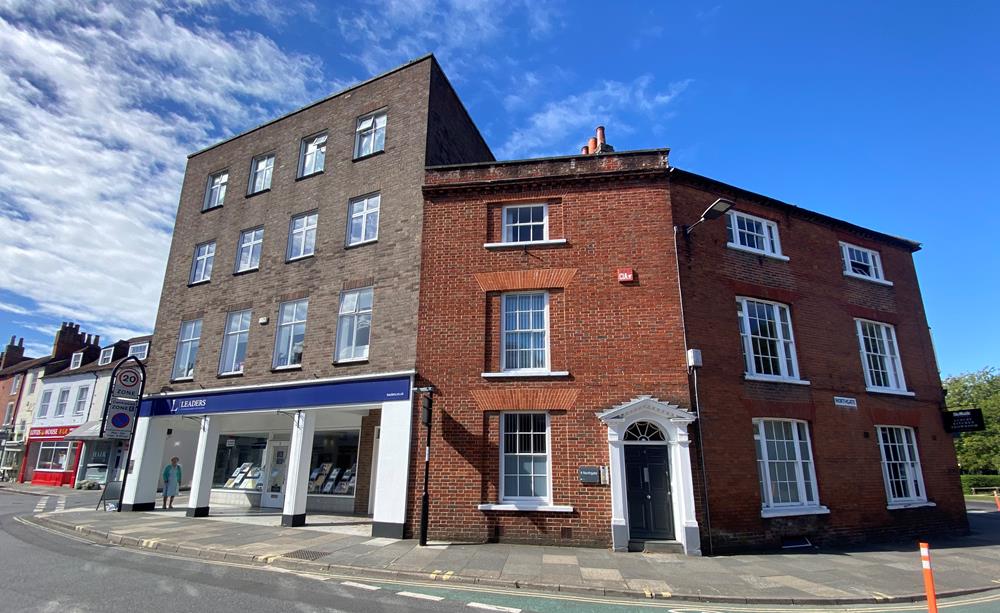 View of Northgate in Chichester showing the Leaders estate agents and period buildings offices.